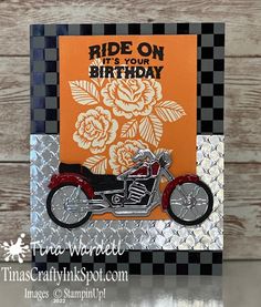 an orange and black birthday card with a motor bike on it's front side