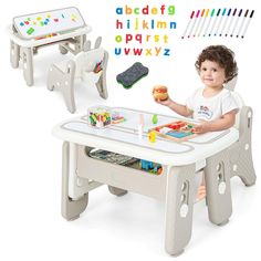 a little boy sitting at a table with toys in front of him and an alphabet play set behind him