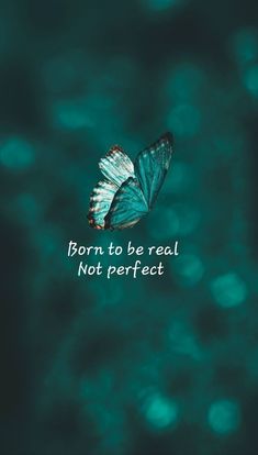 a blue butterfly flying over water with the words born to be real not perfect