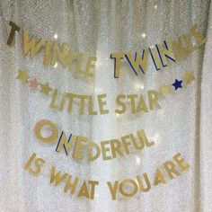 a curtain with words written on it and stars in the background that says twine twinkle little star one wonderful is what you are