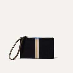 A fan-favorite style made smaller. Our wallet wristlet in black with a beige and ivory center stripe features a smooth zipper closure, secure wrist strap and an interior slip pocket to hold your cards and I.D. Wear it on your wrist or toss it in your bagit works both ways. Black Rectangular Clutch With Wrist Strap, Black Clutch Wallet With Wrist Strap, Modern Rectangular Clutch With Wrist Strap, Black Rectangular Wristlet With Zipper Closure, Evening Rectangular Wristlet With Wrist Strap, Black Leather Wristlet For Evening, Black Pouch Wristlet With Wrist Strap, Modern Wristlet Clutch With Wrist Strap, Black Wallets With Wrist Strap For Evening