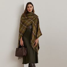 Detailed with faux-leather trim and fringed ends this cozy ruana features a fluid silhouette showcasing the season’s sophisticated plaid pattern. Chic Wool Poncho For Winter, Chic Winter Shawl Poncho, Oversized Winter Poncho With Scarf, Luxury Women's Winter Poncho, Oversized Plaid Poncho For Fall, Ralph Lauren Coats, Ralph Lauren Scarves, Shawl Outfit, Fall Wear