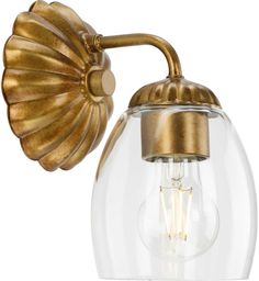 an antique brass finish wall light with clear glass globe shade and gold metal fittings