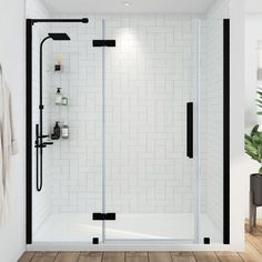 a white bathroom with black accents and wood flooring is pictured in this rendering image