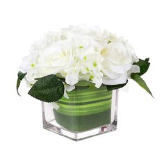 a green vase with white flowers in it on a white background, there is no image here to provide a caption for