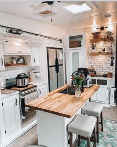 the kitchen is clean and ready to be used as a dining room or living area