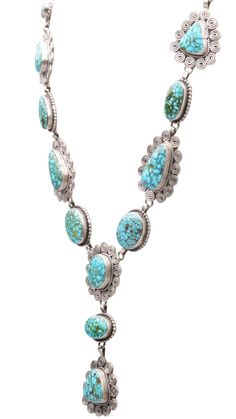 19" Extension: 2 1/4" Enchant your style with this Birdseye Kingman turquoise lariat necklace, where elegance meets the enchantment of the desert. Each turquoise gemstone in this handcrafted masterpiece tells a story of natural beauty, set within gleaming silver that reflects both tradition and individuality. It's not just jewelry; this piece is a wearable work of art that captures the essence of Southwest allure. Birdseye refers to a type of turquoise akin to Spiderweb turquoise, but distinct i Southwestern Style Turquoise Lariat Necklace, Western Style Lariat Necklace For Gifts, Artisan Turquoise Lariat Necklace As Gift, Turquoise Lariat With Natural Stones, Unique Turquoise Lariat Necklace, Turquoise Natural Stones Lariat Jewelry, Artisan Turquoise Lariat Necklace, Turquoise Lariat Gemstone Jewelry, Southwestern Style Turquoise Gemstone Necklace