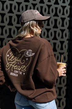 Wild Hearts Can't Be Broken Sweatshirt - Girl Tribe Co. Western Crew Neck Tops For Country Events, Letter Print Tops For Country Concerts In Fall, Fall Letter Print Tops For Country Concerts, Pre-shrunk Tops For Rodeo In Fall, Casual Brown Tops For Western-themed Events, Vintage Tops For Fall Country Concerts, Country Style Tops For Fall Country Events, Country Style Tops For Fall Rodeo, Casual Tops For Country Events In Fall