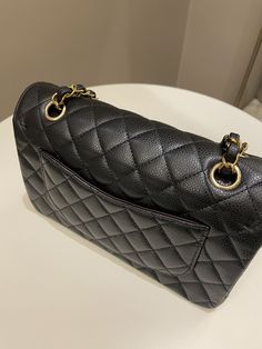 Chanel Classic Quilted Small Double FlapBlack Caviar GHWSmall 23 x 14 x 6.5 cmSingle chain drop 43 cmDouble chain drop 24 cmMicrochipJan 20239.7/10 Like New (inevitable hairline on hardware and underflap imprints otherwise like new)Includes full set box, dust bag and receiptRTP 14,000 sgdPrice now 10,900 sgd 8020 usd CN5565-01 Classic Black Bag With Gold Chain, Gold Ounce, Black Caviar, Black Tote Bag, Black Backpack, Full Set, Chanel Classic, Luxury Bags, Dust Bag