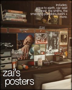 there is a desk with many books on it and a poster above the desk that says zai's posters