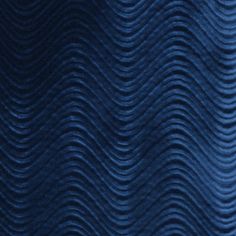 an abstract blue background with wavy lines