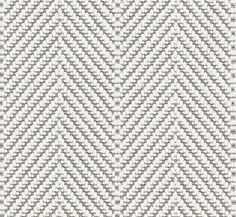 a white and grey zigzag pattern on fabric