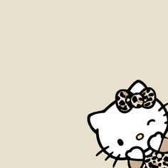 an image of a hello kitty with leopard print on it's head and tail