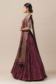 Purple crushed striped zari chanderi lehenga paired with blouse enhanced with zardozi, kasab and kundans. Comes with detachable brocade drape-dupatta embroidered in kasab and sequins.
Component: 3
Embroidered
Neckline: V Neck
Sleeve Length: Half
Fabric: Chanderi, Brocade
Color: Purple
Tassel tie-up back
Bead tassels - Aza Fashions Anarkali Traditional Wear For Reception In Tussar Silk, Tussar Silk Sets For Reception And Navratri, Reception Tussar Silk Choli With Traditional Drape, Bollywood Tussar Silk Anarkali Set For Reception, Bollywood Style Tussar Silk Sharara For Reception, Bollywood Tussar Silk Set For Reception, Anarkali Tussar Silk Lehenga With Sheer Dupatta, Tussar Silk Anarkali Floor-length Set, Tussar Silk Anarkali Set For Reception With Traditional Drape