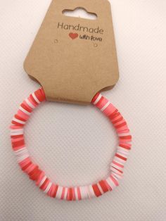 Beautiful beaded bracelet around 2-2.5inch in diameter. Made by a 9-year-old. Please use as intended and not for children under 3 due to small part choke hazard. Pink Bracelet Wristband For Birthday, Trendy Coral Beaded Bracelets, Pink Wristband For Birthday, Adjustable Pink Wristband For Birthday, Casual Coral Bracelets Perfect For Gifts, Pink Hypoallergenic Friendship Bracelets For Birthday, Hypoallergenic Pink Friendship Bracelets For Birthday, Plastic Beaded Friendship Bracelets, Pink Fun Bracelets With Round Beads