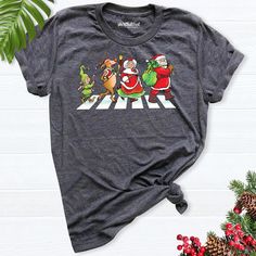 Christmas Shirt,Christmas Parade shirt, Santa reindeer Road Shirt, Merry Christmas Tee, Retro Christmas shirts, Funny Family Christmas party shirt Get into the holiday spirit with our festive Xmas collection! Our Matching Family Christmas tees are perfect for creating memorable moments and celebrating together. Choose from our Retro Christmas shirts for a nostalgic touch or our Merry Christmas tees for a classic holiday look. Whether you're searching for Christmas gifts or a Funny Christmas tee to spread some cheer, we have a variety of options to suit your style. Our Santa Road shirts and Christmas Parade shirts are great for showing off your holiday enthusiasm, while our Santa nana papa shirts and Santa reindeer shirts add a personalized touch to your festive attire. Celebrate the season Christmas Shirts Funny, Santa Tee, Reindeer Shirt, Family Matching Christmas, Family Christmas Party, Christmas Party Shirts, Papa Shirt, Christmas Parade, Shirt Making