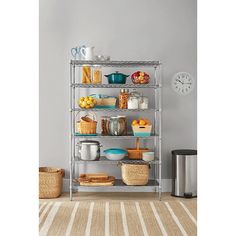 a metal shelving unit filled with lots of food and drinks on top of a rug