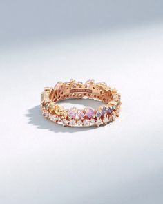 This exquisite eternity band showcases a captivating sequence of princess-cut pastel sapphires, complemented by the subtle radiance of round white diamonds. Set in rich 18-karat gold, the interplay of the gemstones create a stunning visual harmony. Details 18k rose gold 1.25 carat of princess-cut pastel sapphires 0.60 Pastel Rings, Sapphire Eternity Band, Short Stack, Stacked Wedding Rings, Gemstone Wedding Rings, Dream Rings, Wrist Jewelry, Signet Rings, Pretty Rings