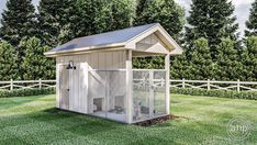 a chicken coop in the middle of a yard