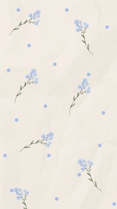 blue flowers and polka dots on white paper