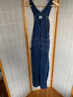 "1970's blue denim Lee's bib overalls Size XS waist: 25\" hips: 34\" inseam: 30\"" Denim Bib Front Overalls, Retro Denim Blue Overalls With Pockets, Blue Utility Overalls With Straight Leg, Blue Utility Straight Leg Overalls, Blue Straight Leg Utility Overalls, Retro Blue Denim Jumpsuit With Pockets, Denim Blue Bib Front Overalls, Vintage Denim Blue Jumpsuit With Pockets, Vintage Denim Blue Overalls With Pockets