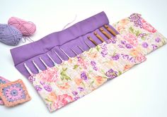 an assortment of knitting needles and crochet hooks