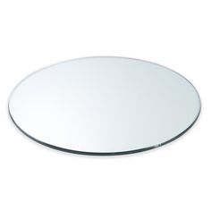 a round mirror on a white background