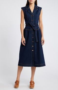 A defining tie cinches the waist of this dark-wash denim midi that layers stylishly from work to weekend. 47" length (size Medium) Front button closure Notched collar Sleeveless Removable tie belt Unlined 91% cotton, 8% viscose, 1% spandex Dry clean or hand wash, dry flat Imported Chic Sleeveless Belted Denim Dress, Chic Belted Sleeveless Denim Dress, Casual Sleeveless Belted Denim Dress, Casual Sleeveless Dark Wash Midi Dress, Sleeveless Dark Wash Workwear Dress, Sleeveless Dark Wash Dress For Work, Dark Wash Sleeveless Dress For Work, Indigo Denim Dress For Work, Chic Medium Wash Belted Denim Dress