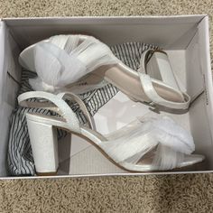 Cute White Wedding Heels. Super Comfortable. From David’s Bridal. Never Been Worn. Perfect Condition. Formal Synthetic Block Heel Wedding Shoes, Formal Low Heel Synthetic Wedding Shoes, Formal Wedding Shoes With Low Heel, White Sandals For Bridesmaid In Spring, White Low Heel Sandals For Bridal Shower, Formal Open Toe Synthetic Wedding Shoes, White Sandals For Spring Bridesmaid, Synthetic Wedding Shoes With Heel Strap, Wedding Sandals With Heel Strap