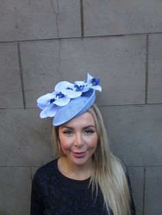 This hat is perfect for special occasions. Featuring light blue artificial orchids on a tilted disc hat. Mounted on a thin headband. The base measures 20cm across. Perfect for races, weddings and special occasions! Made in the UK    Many more items like this are available in our shop! Made in the UK - custom orders are welcome Blue Orchid Flower, Hat Fascinator, Artificial Orchids, Headband Wedding, Fascinator Headband, Blue Orchids, Hat Box, Orchid Flower, Feature Light