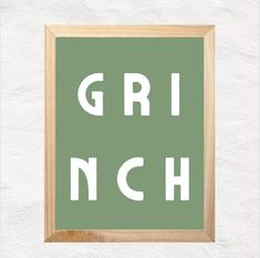 a green and white poster with the word gri nch in it's center