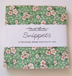 a green and white flowered fabric with the words model snippets on it