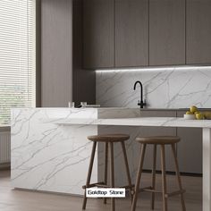 two stools in front of a kitchen island