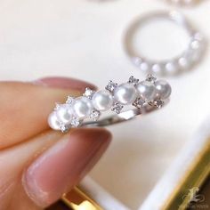 Highlight: Short Balance Ring Product Information OriginJapan MaterialAkoya Pearl, 18k Gold, and Natural Diamonds DimensionsCustomize Pearl Shaped: Round Size: 3-3.5 mm Quality: AAA Nacre: Very Thick Color: White Luster: Aurora Accessories Metal: 1.91 g of 18k White Gold Other: 0.12 ct of SI Quality Natural Diamonds Akoya Pearl Rings With Diamond Accents, White Akoya Pearl Rings With Diamond Accents, Fine Jewelry White Gold Pearl Ring With Prong Setting, White Gold Pearl Ring With Cubic Zirconia, White Gold Pearl Ring With Prong Setting, Fine Jewelry Akoya Pearl Diamond Ring With Accents, Exquisite White Gold Akoya Pearl Ring, Akoya Pearl Diamond Ring With Accents, Akoya Pearl Diamond Ring With Diamond Accents