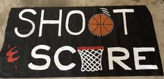 a sign that says shot score with basketballs on it