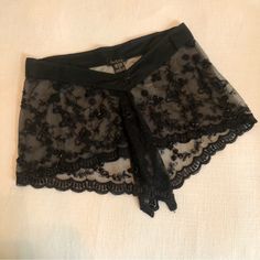 Twenty One Sheer Black Lace Skirt Cover-Up Nwot * Darling Black Sheer Lace Cover-Up * Adorable Bead Embellishments * Extra Beads (Spare) Included * Super Cute * Waist Band Button Is Missing Elegant Short Skirt For Parties, Sheer Lace Bottoms For Evening, Fitted Brief Shorts For Night Out, Black Sheer Mini Skirt, Fitted Sheer Mini Skirt For Party, Lace Bottoms For Night Out, Lace Mini Skirt For Summer Party, Flirty Lace Skirt For Party, Summer Party Lace Mini Skirt