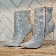 Super Cute, Jewel Encrusted Glittery Booties. Size 9.5. New, Never Worn Outside, Only Tried On. 4 In Stiletto Heel. Medium Width. Comfortable Insole. Opening Is 10.5 In Circumference And Sits Above The Ankle. Glamorous Glitter Heels For Winter, Glitter High Heels For Winter, Sparkling Round Toe Heels For Winter, Winter Sequin Heeled Shoes With Round Toe, Winter Sequined Round Toe Heels, Fall Glitter High Heels, Sparkling High Heels For Fall, Glitter Round Toe Heels For Winter, Winter Glitter Heels With Round Toe