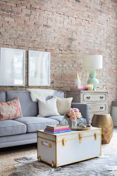 an image of a living room with furniture and decor on the bottom right hand corner