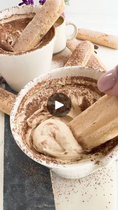 two bowls filled with ice cream sitting on top of a counter