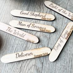 wooden spoons with engraved names on them