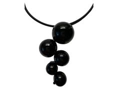 Add an elegant touch to your outfit with this large black pendant made of round balls of Murano glass. Handcrafted with precision and sophistication, this unique statement piece exudes style and charm. The deep black color of the glass adds a touch of mystery and allure, while the intricate design of the round balls showcases the artistry of the skilled artisan. Perfect for both casual and formal occasions, this pendant is sure to make a lasting impression. Elevate your jewelry collection with t Modern Black Necklace For Evening, Modern Black Necklace With Large Pendant, Modern Black Enamel Necklaces, Modern Black Necklaces For Parties, Modern Black Necklace For Party, Black Round Glass Jewelry, Modern Glass Necklaces For Formal Events, Modern Glass Necklaces For Formal Occasions, Black Round Necklace For Evening