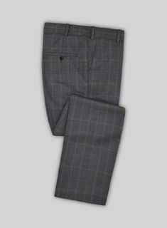 Take a fashion-forward stance by donning our exquisite Scabal Quart Checks Gray Wool Suit. Meticulously crafted from a wool-rich fabric, its gray base color exudes a sense of formality, while the tasteful colored checkered design in shades of blue adds a delightful pop of color, infusing a touch of playfulness into your look. This ultimate tailored suit effortlessly delivers a classic and timeless appearance, making it perfect for both formal events and professional workdays. 
  Look Includes Fitted Gray Winter Suit, Elegant Gray Winter Suits, Gray Wool Suit For Business Casual, Gray Wool Suit For Semi-formal Occasions, Gray Wool Suits For Semi-formal Occasions, Elegant Gray Wool Suit, Timeless Gray Wool Suits, Gray Formal Suit For Fall, Elegant Fitted Gray Suit