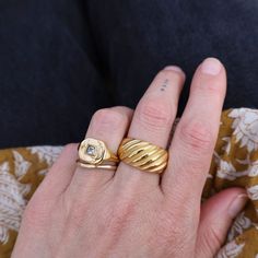 Whether worn as a standalone statement piece or stacked with other rings for a bolder look, the Striated Gold Ring effortlessly complements any ensemble, from casual to formal. 18kt gold plated stainless steel Color variations may exist compared to the jewelry photographed. Gold Wide Band Ring Tarnish Resistant For Everyday, Vintage Gold Plated Tarnish Resistant Rings, Gold Plated Thick Band Metal Ring, Everyday Gold Wide Band Ring, Tarnish Resistant, Gold Stackable Metal Rings For Everyday, Gold Metal Stackable Rings For Everyday Use, Gold Stackable Rings For Everyday Wear, Classic Metal Rings Tarnish Resistant, Classic Metal Ring With Thick Band