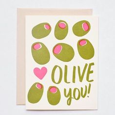 a card with pink and green olives on it that says olive you in cursive writing