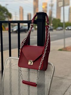 This handmade dark red leather bag combines elegance and durability in a timeless design. Our cherry red purse is crafted from high-quality full-grain leather. Its box shape adds a unique touch, while the rich dark red makes it a standout accessory. Each leather purse is meticulously handcrafted, reflecting the personal care and attention that goes into every detail. Elevate your style with a bag that looks great and is built to last. Perfect for those who appreciate the beauty and story behind Formal Red Shoulder Bag With Smooth Grain, Formal Red Smooth Grain Shoulder Bag, Classic Red Crossbody Box Bag, Classic Red Box Bag For Daily Use, Red Square Satchel For Formal Occasions, Red Square Formal Satchel, Classic Red Satchel Box Bag, Classic Red Box Shoulder Bag, Classic Red Shoulder Box Bag