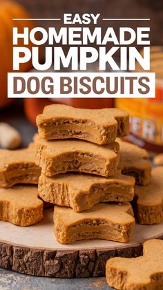 homemade pumpkin dog biscuits stacked on top of each other