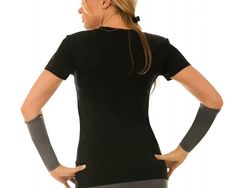 Look your best during workouts with the flattering I.F. Pro Short Sleeve V-Neck Top. The compression fabric on this workout top is great for athletic performance as well as for shaping your figure. Whether you work out at the gym, at a yoga studio or outdoors, this short-sleeve athletic top helps to keep your cool and comfortable during any physical activity. The V-neck style is tasteful and feminine, and you can pick from black, grey or fuchsia pink depending on your favorite fashions. Find a r Functional Fitted Tops For Yoga, Supportive Black Tops For Yoga, Compression Go-dry Tops For Pilates, Go-dry Fitted Tops For Training, Fitted Go-dry Tops For Training, Fitted Crew Neck Top For Pilates, Fitted Moisture-wicking Tops For Pilates, Fitted Sportswear Tops For Pilates, Functional Fitted Tops For Pilates