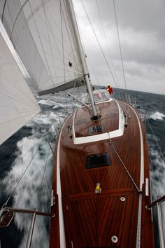 the sailboat is sailing through choppy water