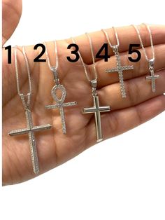 ●Solid Sterling 925 Silver Cross  and Ankh charm/pendant with chain, Dije de cruz con cadena ●Metal : 925 Sterling Silver ●Purity : 925 with authenticity stamp ●Made in : Italy ●Style 1: Cross with CZ ●Style 2: Ankh with CZ ●Style 3 : plain Cross ●Style 4: Cross with Cz ●Style 5: Cross with Cz Chain style - Box Chain length : 18 & 20  ●Stone: CZ Cubic Zirconia ●Condition : Brand New ●Clasp : Lobster Clasp ●Complimentary Premium Jewelry box included ●Free Shipping within U.S.A Be sure to hit "favorite" on the right so it remains on your favorites list and/ or add to your wishlist(s). BUY GENUINE GOLD JEWELRY WITH 100% CONFIDENCE Cross Pendant Box Chain Jewelry Gift, Silver Symbolic Cross Necklace As Gift, Sterling Silver Crucifix Charm Jewelry, Silver Cross Jewelry With Charms, Sterling Silver Cross Box Chain Necklace, Adjustable Silver Cross Charm Necklace, Casual Silver Hypoallergenic Cross Pendant Jewelry, Silver Crucifix Charm Necklace For Gift, Hypoallergenic Silver Cross Pendant Jewelry