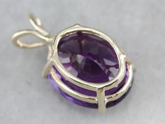 This amethyst gem is bursting with brilliant purple color! The oval cut faceting optimizes its luster, and the yellow gold only compliments the stone with its warm hue. This pendant could be worn everyday or for special occasions! This pendant does not come with the chain shown. Please feel free to contact us, we will help you find the perfect chain for your style and budget! Metal: 14K Yellow Gold Gem: Amethyst 14.00 Carats Gem Measurements: 17.7 x 14.5 mm, Oval Measurements: 26 x 15 mm, with b Snowflake Pendant, Gold Snowflake, Cameo Ring, Amethyst Gem, February Birthstone, Statement Pendant, Solitaire Pendant, February Birth Stone, Eternity Bands